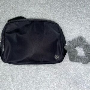 Black lululemon belt bag 1L. Gray scrunchy. #lululemon #fancy #casual #athletic